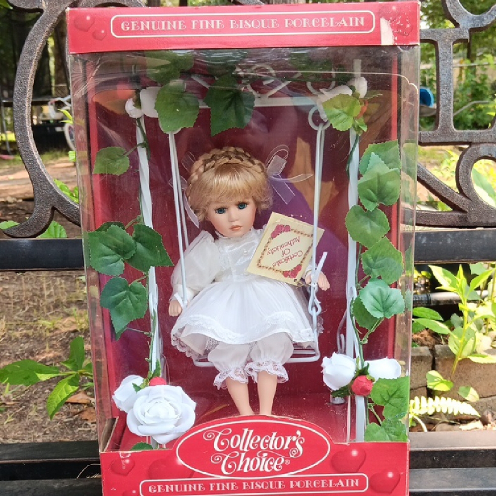 Porcelain Doll in Elegant White Dress